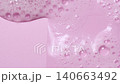 Slow motion close-up soap foam texture on pink background, white shampoo soapsud 140663492