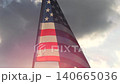 close up American flag waving in the wind against sunset with slow motion. outdoor background for 4th of July, Memorial Day, Independence Day, Veterans Day, Celebrate USA, American President Election 140665036