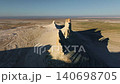 Aerial view of unique rock formations in vast desert landscape at sunrise 140698705