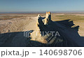 Aerial view of unique rock formations in vast desert landscape at sunrise 140698706