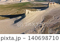 Aerial view of unique rock formation with shadows and surrounding landscape 140698710