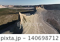 Aerial view of dramatic white cliffs and expansive landscape under clear sky 140698712