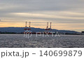 Osaka Port and cranes at dusk 140699879
