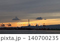 Osaka Port at dusk, gantry cranes, and clouds 140700235
