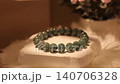 Burmese jade stone bracelet on rotating display stand 140706328