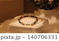 Natural stone bracelet on rotating display stand with clear view 140706331