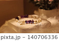 Stone bracelet on display stand showcases fine craftsmanship 140706336