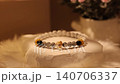 Natural stone bracelet display on rotating stand in soft light 140706337