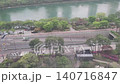 High-Angle View of Seokchon Lake Walkway and Cars Passing Through the Underpass in Seoul 140716847