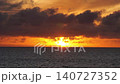 The morning sea symbolizes rebirth and hope. 140727352