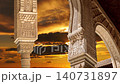 Arches in Islamic (Moorish)  style (against the sunset) in Alhambra, Granada, Spain. 4K, time lapse    140731897