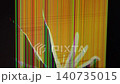 A shattered screen showing vibrant vertical lines and digital glitch patterns, illustrating a broken display panel with severe hardware damage requiring urgent professional repair 140735015