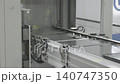 Conveyor rail system. Material box handling, Industrial automation. Precision transport system in Smart factory. 140747350