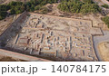 Harappa ancient street with covered drainage between brick houses at sunrise 140784175