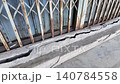 Cracks in concrete at building entrance in urban area observed 140784558