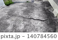 Cracks in concrete at building entrance in urban area observed 140784560