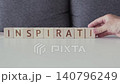 motivational word inspiration, laying out  by hand from letters on wooden cubes, slow motion 140796249