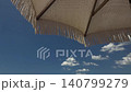 White umbrella on blue sky 140799279