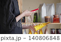 Customer Scanning Coffee Package With Smartphone To Access Product Information Before Purchase In Grocery Store, Mobile Shopping And Digital Consumer Concept 140806848