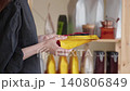Customer Comparing Coffee Products Before Purchase, Evaluating Product Information And Ingredients To Make Informed Consumer Choice In Grocery Store, Product Comparison Concept 140806849