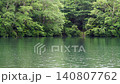 The scenery of Lake Yunoko surrounded by fresh greenery in the rainy Oku-Nikko. 140807762