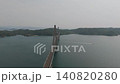 Drone aerial view of Takashima Bridge spanning the blue sea 140820280