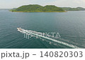 Drone footage showing a beautiful blue sea and boats from above. 140820303