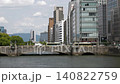 Cars and pedestrians crossing Yodoyabashi Bridge over the Tosabori River in Nakanoshima, Osaka Cars and pedestrians crossing Yodoyabashi Bridge over the Tosabori River in Nakanoshima, Osaka 140822759