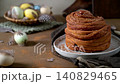 Fresh Cinnamon Roll with Easter Eggs and Spring Decor 140829465