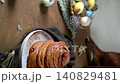 Vertical Portrait of Gourmet Cinnamon Bun with Easter Accents 140829481