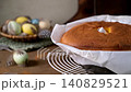 Golden Brown Pao de Lo Sponge Cake in Parchment Paper with Easter Eggs 140829521