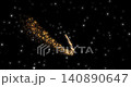 An abstract video showcases a flight of a golden particle trail through deep starry space. The glowing comet dust creates a magical cosmic atmosphere across the dark galaxy background. 140890647