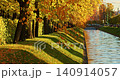Lebyazhya kanavka embankment to the engineering palace, Trees with yellow leaves of the Summer garden in sunny autumn evening, Russia, Saint Petersburg 140914057