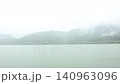 Lake and rain 140963096