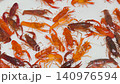 4K Many orange crayfish crawling together in a white plastic container 140976594