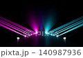 A futuristic dark runway with cyan and magenta spotlights and a reflection on the floor. 140987936
