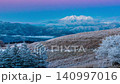 A panoramic view of Mount Ontake bathed in pink light from the Kirigamine Plateau at dawn ⇒ Slide to the right 140997016