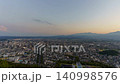 【右搖鏡頭】福島市：都市夜景縮時攝影 - 高樓俯瞰與鐵路交通 - 傍晚景色 140998576