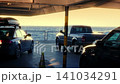 Cars On Ferry Deck At Sunset 141034291