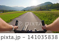 POV of cyclist riding on asphalt road bike path in Slovenia 141035838