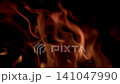 Captivating Flames are Constantly Dancing Passionately in the Dark, Creating a Mesmerizing Display Captivating Flames are Constantly Dancing Passionately in the Dark, Creating a Mesmerizing Display 141047990