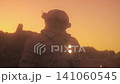 Cinematic Astronaut Standing on Alien Desert Planet at Golden Sunset 141060545