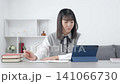 Female student studying using a tablet PC 141066730