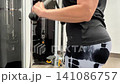 A person demonstrates various arm exercises  141086757