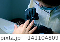 woman hands with light pink manicure on the nails. Skin care for hands, manicure and beauty treatment. Elegant and graceful hands with slender graceful fingers 141104809