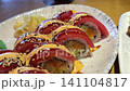 Tuna sushi rolls with japanese mayonnaise served on elegant white oval plate 141104817