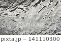 Clear river water flow with calm ripples over rocks. 141110300