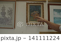 Thai art concept of 4k Resolution. The artist is presenting his work in the exhibition room. 141111224