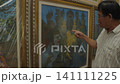 Thai art concept of 4k Resolution. The artist is presenting his work in the exhibition room. 141111225