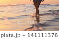 Happy young woman having fun at the beach. Slow motion 141111376